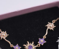 Colar de girassol roxo com banho de ouro